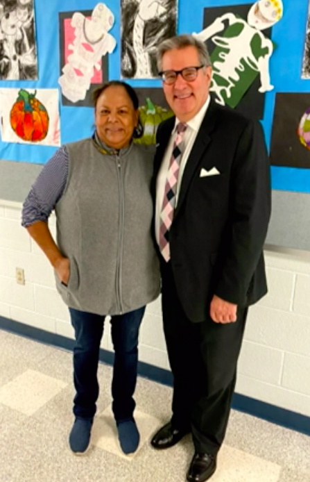 Superintendent Steven Walts with Dinora Mejia